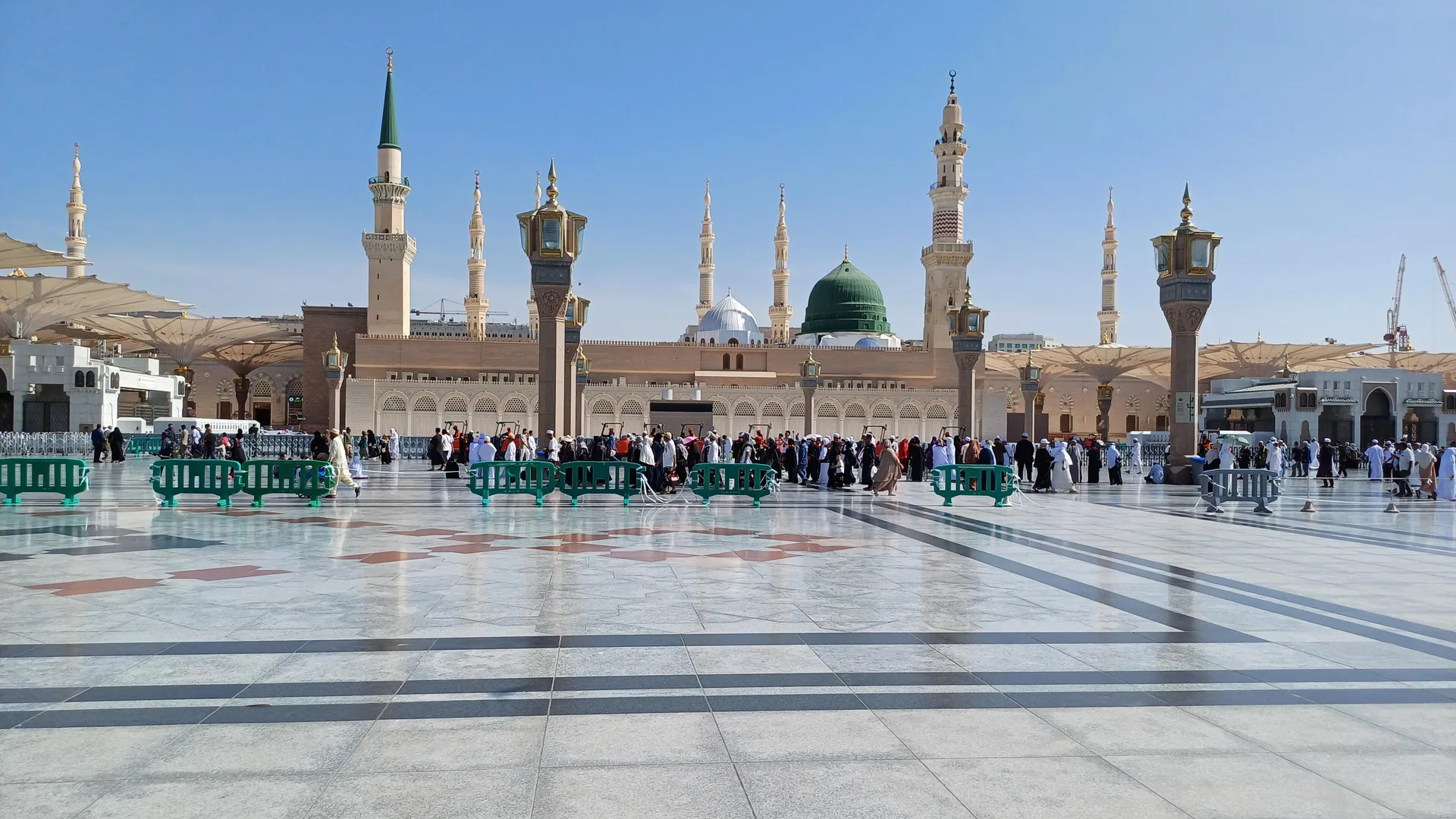 The courtyard of Masjid an-Nabawi in Madinah with the Green Dome