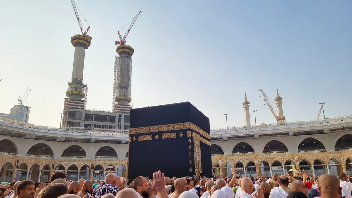 Crowds of pilgrims around the Kaaba at Masjid al-Haram