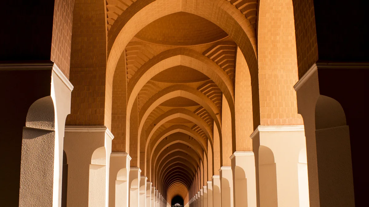 An arched walkway at the Dhul Hulayfah miqat mosque near Madinah