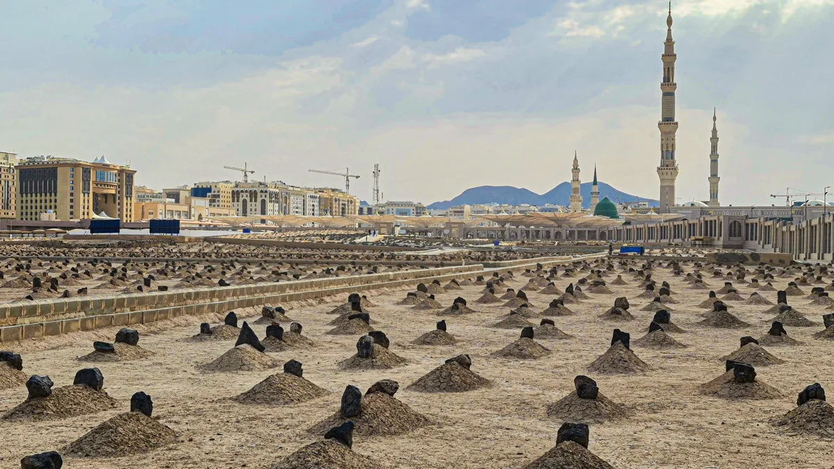 Plain graves in Jannat al-Baqi marked with small stones