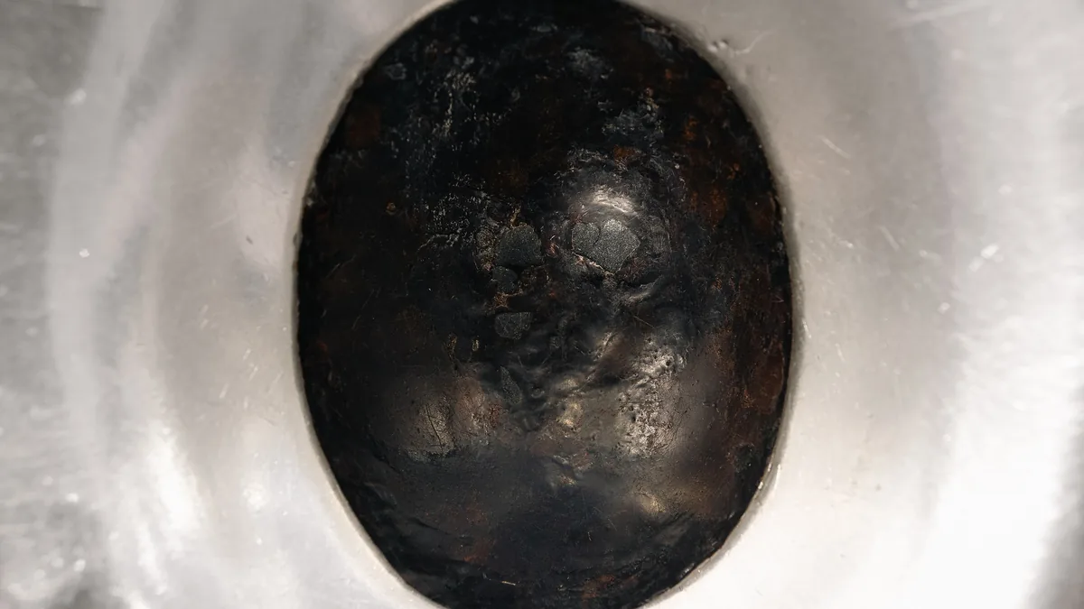 The Black Stone in its silver frame on the corner of the Kaaba