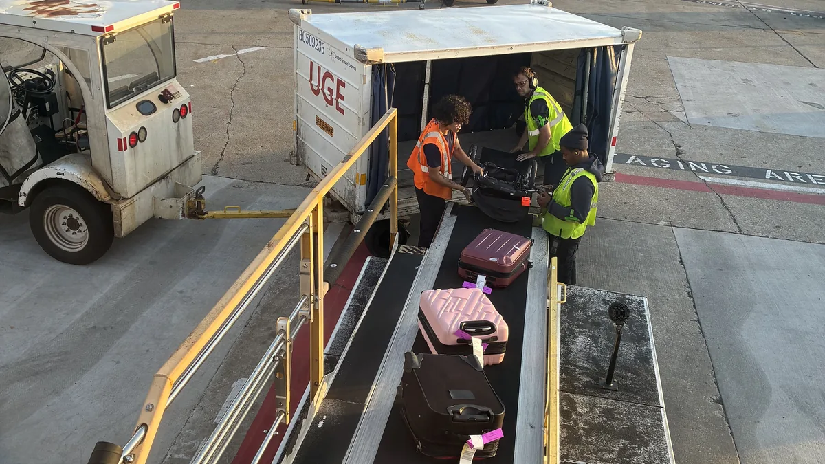 Luggage being loaded for an air journey