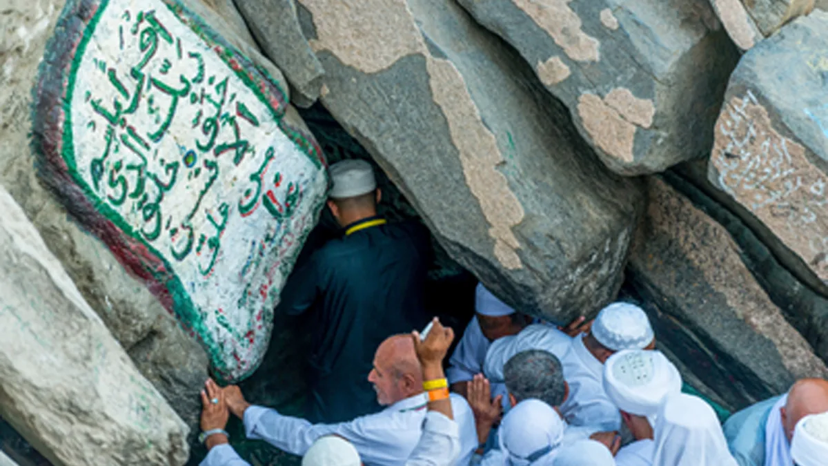 Visitors at the narrow entrance of Cave Hira on Jabal al-Nour