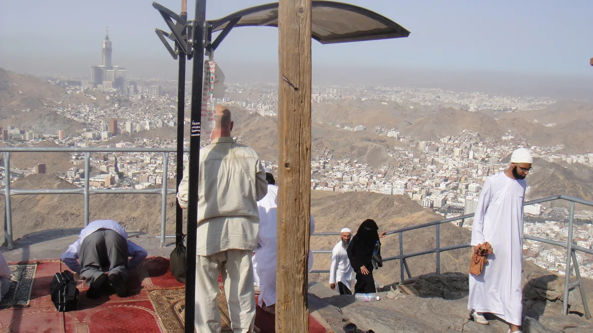 Visitors on the rocky top of Jabal al-Nour